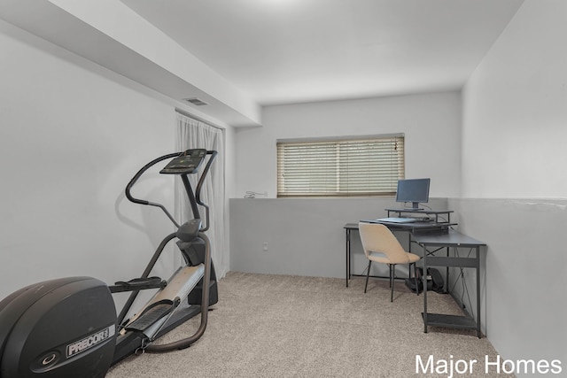 workout area featuring carpet flooring and visible vents