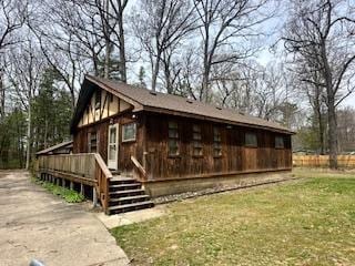 921 Fourth St, Pullman, MI 49450 - view of side of property with a wooden deck and driveway