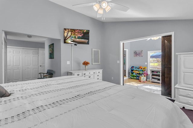 bedroom featuring ceiling fan, lofted ceiling, and a closet