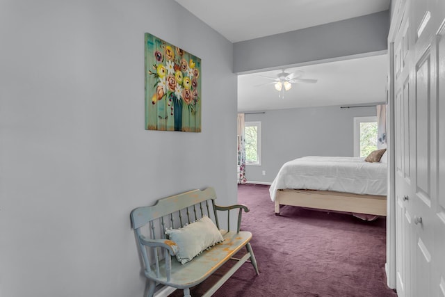 bedroom with carpet floors, a ceiling fan, and baseboards