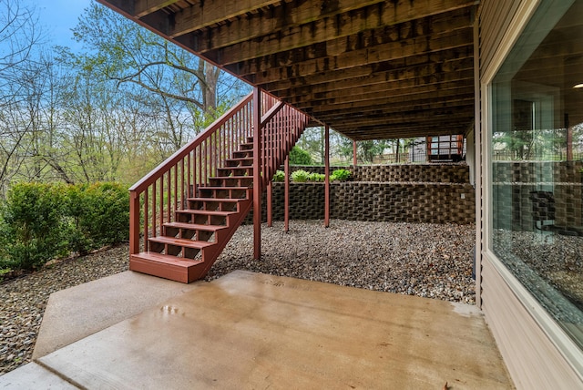 view of patio featuring stairway