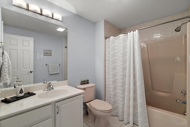 bathroom featuring vanity, shower / bath combination with curtain, toilet, a textured ceiling, and tile patterned floors
