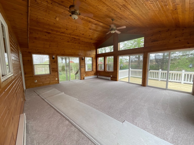 unfurnished sunroom with a baseboard radiator