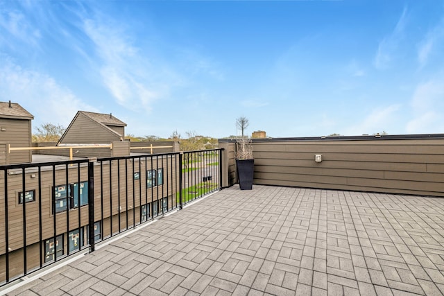 1049 Hampton Cir Unit 44, Detroit, MI 48207 - view of patio / terrace featuring a balcony