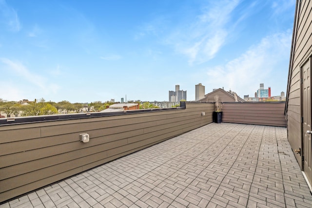 1049 Hampton Cir Unit 44, Detroit, MI 48207 - view of patio with a city view