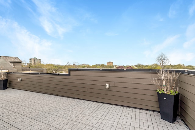 1049 Hampton Cir Unit 44, Detroit, MI 48207 - view of patio / terrace featuring a balcony