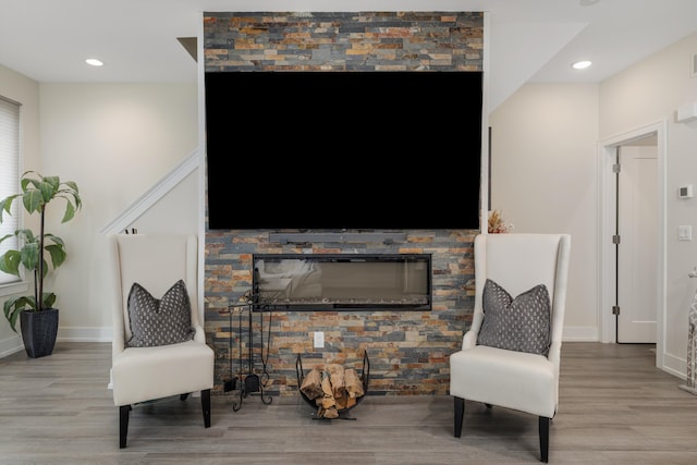1049 Hampton Cir Unit 44, Detroit, MI 48207 - living area with baseboards, recessed lighting, and wood finished floors