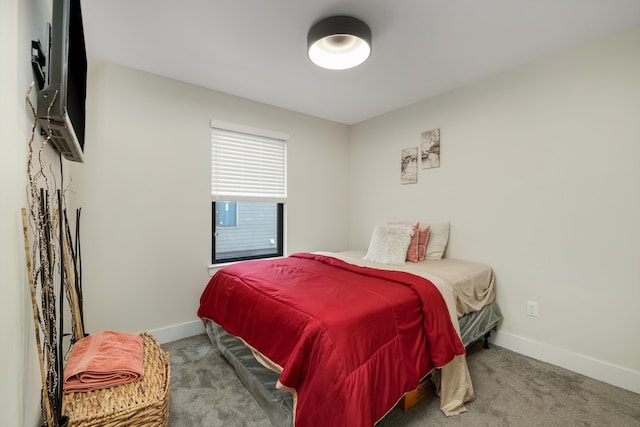 1049 Hampton Cir Unit 44, Detroit, MI 48207 - carpeted bedroom with baseboards