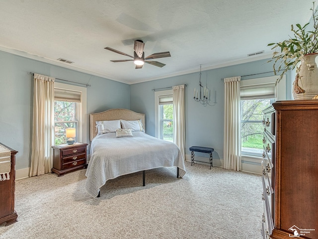 6603 S Stony Creek Rd, Monroe, MI 48162 - carpeted bedroom featuring visible vents, crown molding, and multiple windows