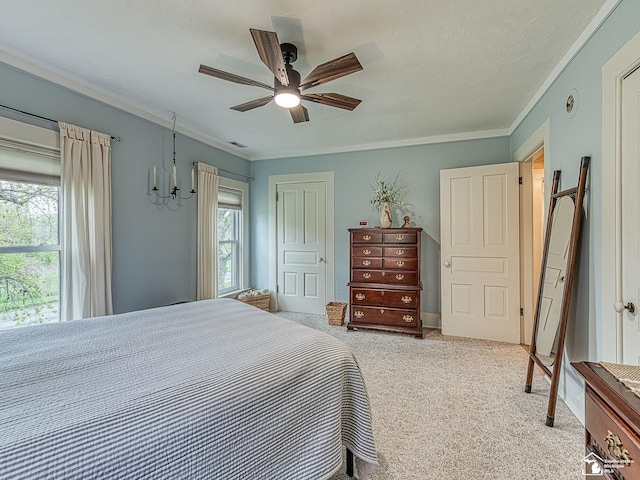 6603 S Stony Creek Rd, Monroe, MI 48162 - bedroom featuring crown molding, a ceiling fan, light colored carpet, and multiple windows