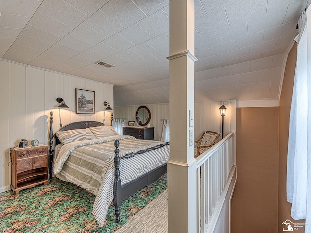 6603 S Stony Creek Rd, Monroe, MI 48162 - bedroom with carpet floors, ornate columns, and visible vents
