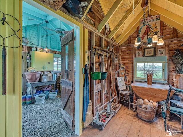6603 S Stony Creek Rd, Monroe, MI 48162 - misc room with vaulted ceiling with beams and hardwood / wood-style floors