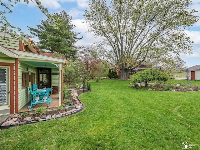 6603 S Stony Creek Rd, Monroe, MI 48162 - view of yard featuring a patio area