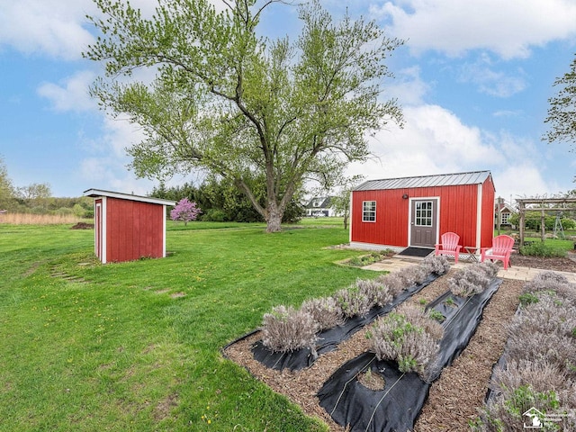 6603 S Stony Creek Rd, Monroe, MI 48162 - view of yard with an outdoor structure and a shed