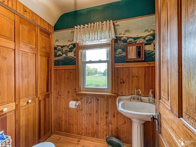 6603 S Stony Creek Rd, Monroe, MI 48162 - bathroom with wooden walls and wood finished floors