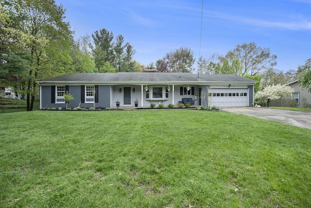 2134 Sycamore Ln, Kalamazoo, MI 49008 - ranch-style home featuring a porch, a garage, driveway, a front lawn, and a chimney