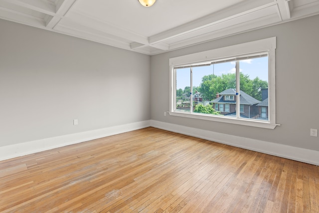 109 Leicester Ct, Detroit, MI 48202 - spare room with coffered ceiling, light wood finished floors, beamed ceiling, and baseboards