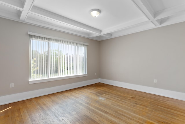 109 Leicester Ct, Detroit, MI 48202 - spare room featuring coffered ceiling, baseboards, healthy amount of natural light, light wood finished floors, and beam ceiling