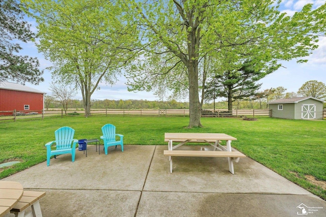 485 W Samaria Rd, Temperance, MI 48182 - view of patio / terrace featuring an outdoor structure, a fenced backyard, and a shed