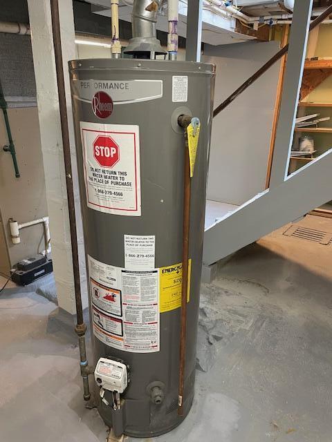 utility room with water heater