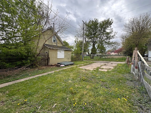 view of yard featuring fence