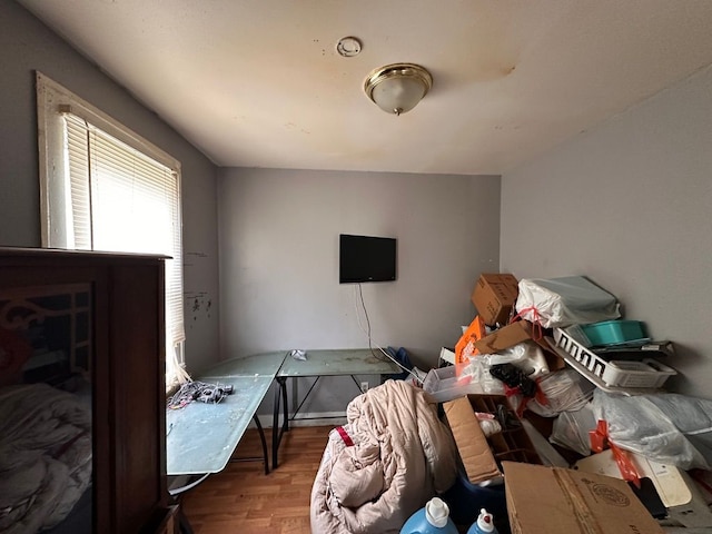 bedroom featuring wood finished floors