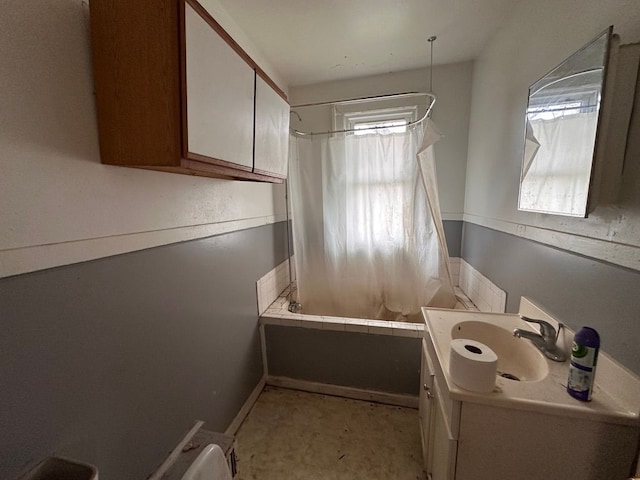 full bath featuring vanity and shower / tub combo