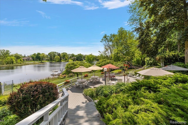 62 Robertson Ct, Clarkston, MI 48346 - dock area featuring a water view and outdoor dining area