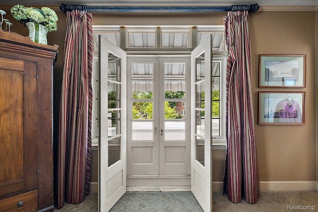 62 Robertson Ct, Clarkston, MI 48346 - doorway featuring french doors, baseboards, and carpet flooring