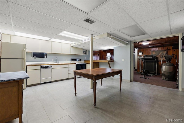 62 Robertson Ct, Clarkston, MI 48346 - kitchen with white appliances, a paneled ceiling, white cabinetry, and a sink