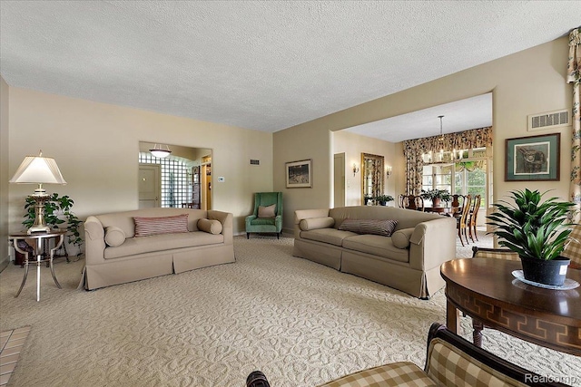 62 Robertson Ct, Clarkston, MI 48346 - living area with a chandelier, carpet flooring, and a textured ceiling