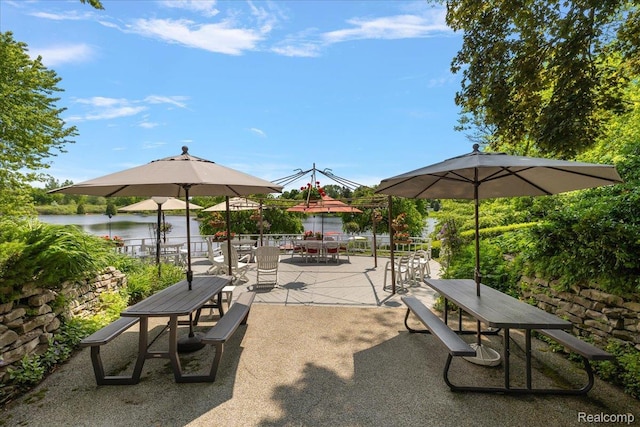 62 Robertson Ct, Clarkston, MI 48346 - view of community featuring outdoor dining area, a patio area, and a water view