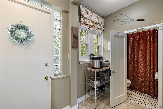 62 Robertson Ct, Clarkston, MI 48346 - full bathroom featuring toilet, tile patterned floors, and curtained shower