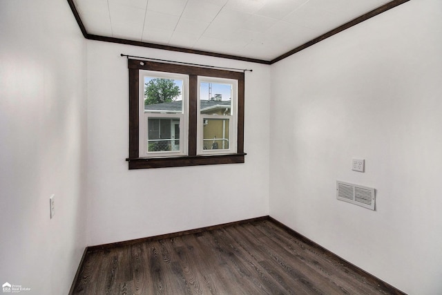 187 S Saginaw St, Montrose, MI 48457 - empty room with ornamental molding and dark wood-style floors