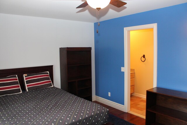 bedroom featuring wood finished floors