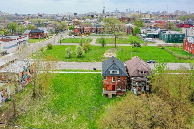 drone / aerial view featuring a city view