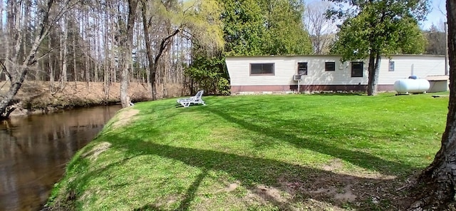 view of yard featuring a water view