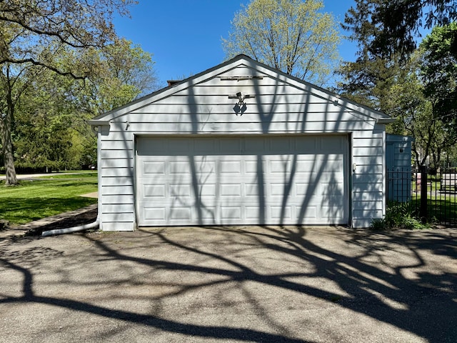 detached garage with fence