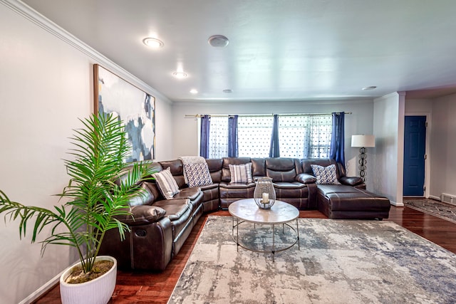 living room with wood finished floors, crown molding, baseboards, and recessed lighting