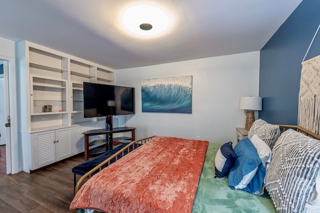 bedroom with wood finished floors