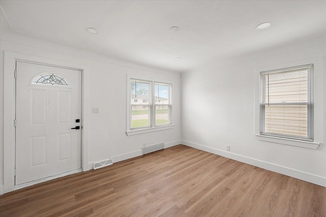 20040 E 8 Mile Rd, Harper Woods, MI 48225 - entryway with light wood-style flooring, baseboards, and recessed lighting