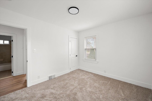 20040 E 8 Mile Rd, Harper Woods, MI 48225 - unfurnished room with baseboards and carpet floors