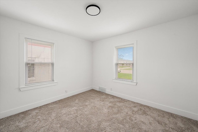 20040 E 8 Mile Rd, Harper Woods, MI 48225 - unfurnished room with light colored carpet and baseboards