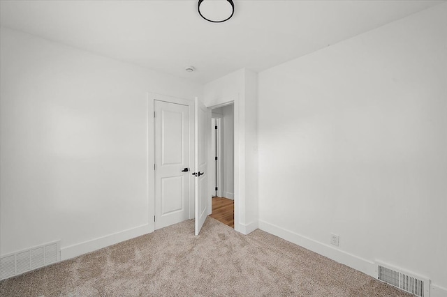 20040 E 8 Mile Rd, Harper Woods, MI 48225 - spare room featuring carpet flooring and baseboards