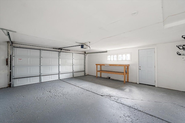 20040 E 8 Mile Rd, Harper Woods, MI 48225 - garage featuring a garage door opener