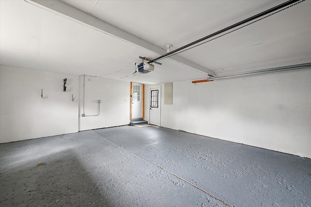 20040 E 8 Mile Rd, Harper Woods, MI 48225 - garage featuring a garage door opener