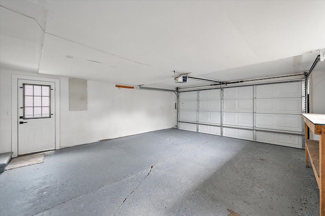 20040 E 8 Mile Rd, Harper Woods, MI 48225 - garage featuring a garage door opener