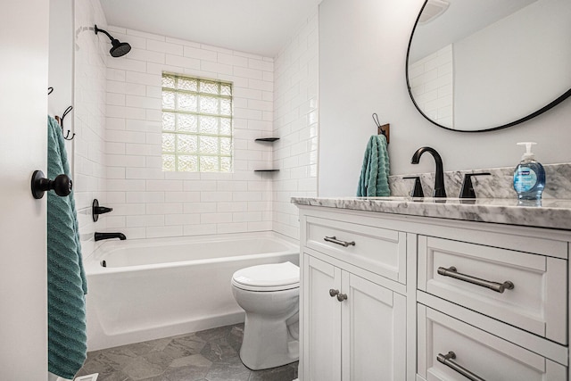 full bath featuring vanity,  shower combination, and toilet