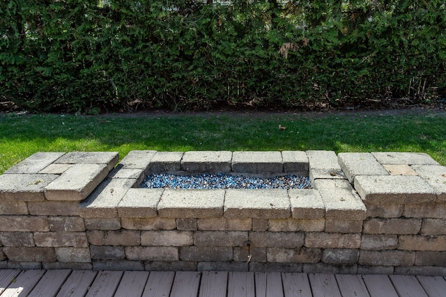 exterior space featuring an outdoor fire pit