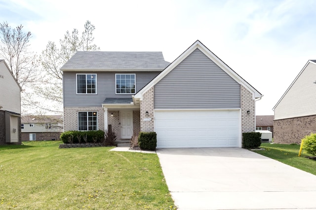 view of front of property featuring concrete driveway, brick siding, an attached garage, and a front yard